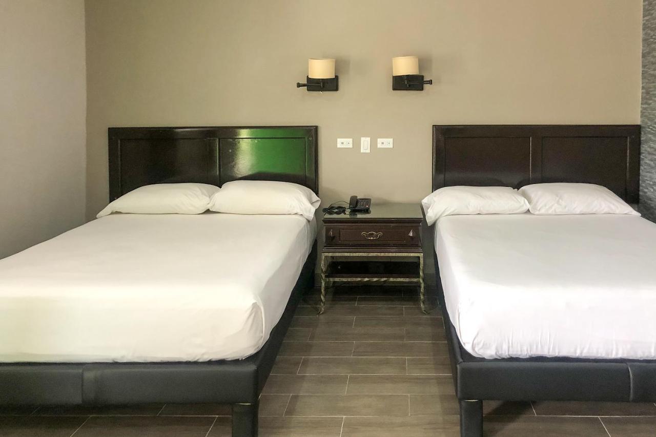 Capital O Palms Hotel, Acuna Ciudad Acuña Екстериор снимка
