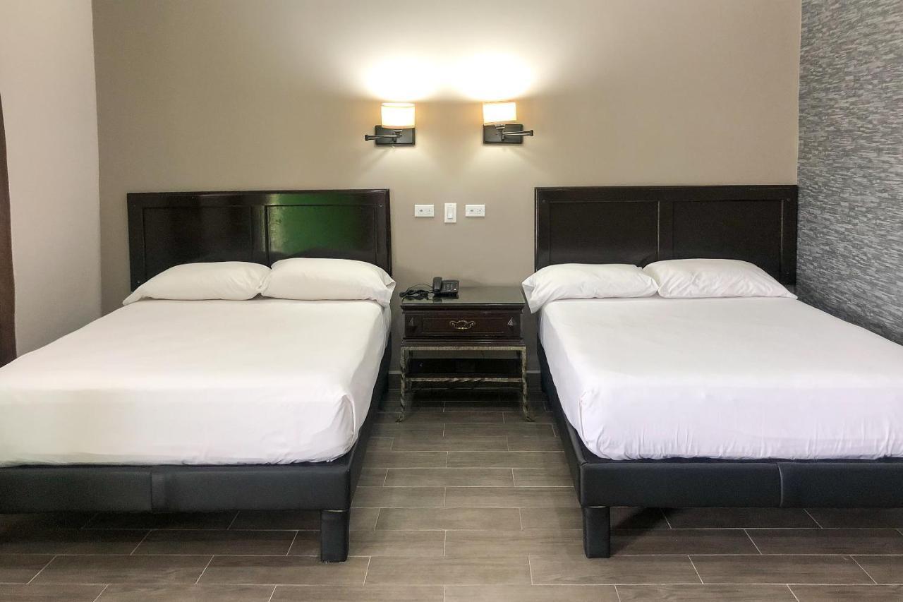 Capital O Palms Hotel, Acuna Ciudad Acuña Екстериор снимка