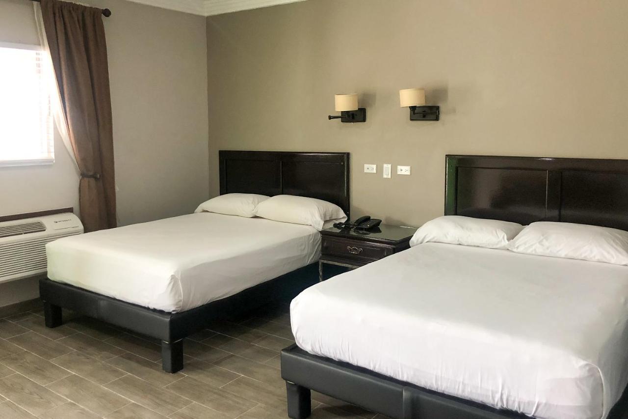 Capital O Palms Hotel, Acuna Ciudad Acuña Екстериор снимка